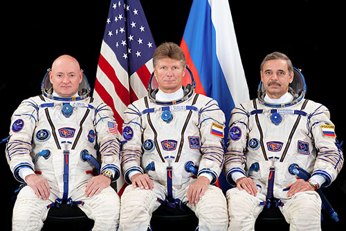 NASA Flight Engineer Scott Kelly, a UT Space Institute graduate, poses with Gennady Padalka and Mikhail Kornienko of Roscosmos. The three are scheduled to launch for the International Space Station on Friday. (Photo credit: Roscosmos/GCTC)