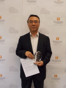 Photo of Professor Kihm with Open Education Award