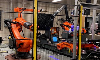 red manufacturing robots in Dr. Schmitz lab