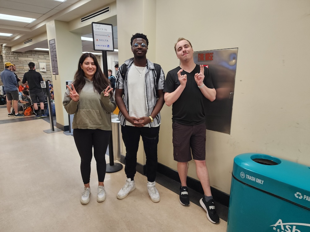 Left to right: Victoria Rapalo, Semilore Abiodun-Adeniyi, and Bryce Bible in the airport waiting to fly to Japan