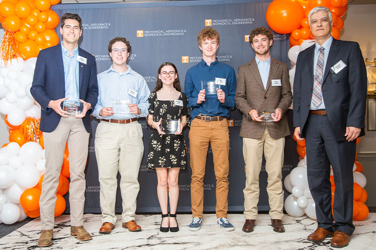MABE students receive their awards at the Awards Banquet.